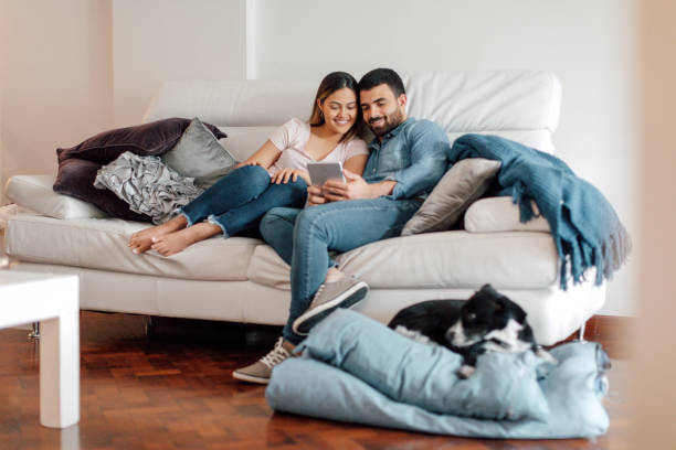 istock Young couple relaxing at home 2156377264