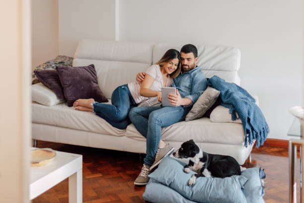 istock Young couple relaxing at home 2156377487