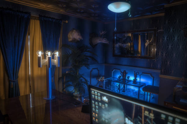 POV view from an office desk in a dramatic curated vintage blue room