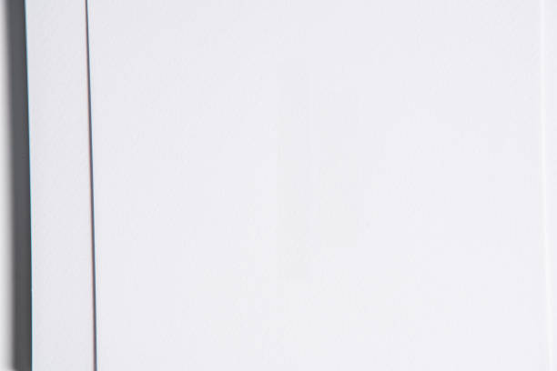 istock A minimalistic mockup of a notepad with a shadow, ideal for clean and simple design presentations. 2156379059