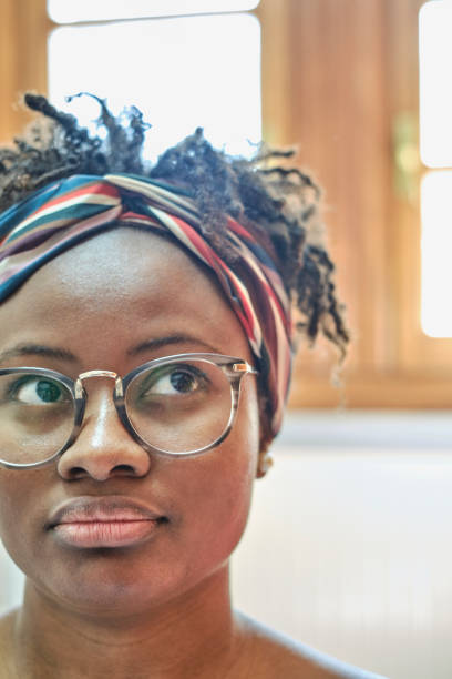 istock young black woman with glasses. 2156380774