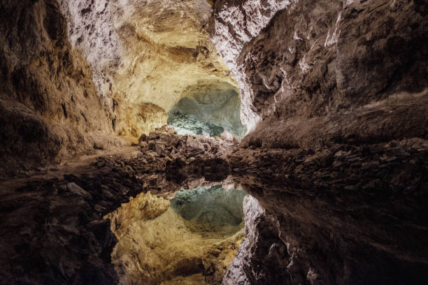 Interior shot of an illuminated volcanic cave