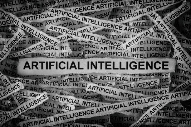 istock Strips of newspaper with the words Artificial Intelligence typed on them 2156388877