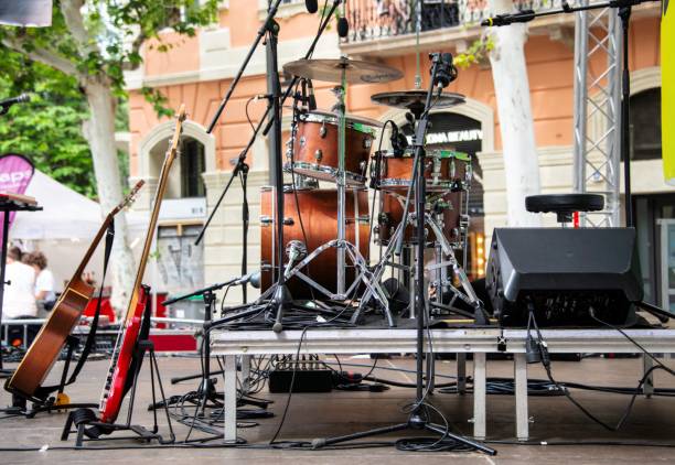 Barcelona, Spain - 05 25 2024: small concert stage with music instruments and no people at a street festival outdoors in Barcelona