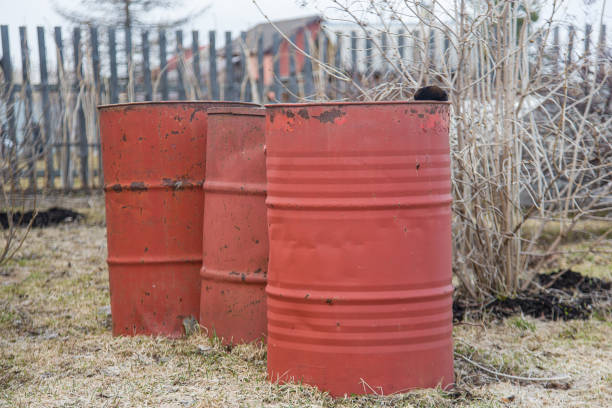 istock red metal barrels on the garden plot 2156393219