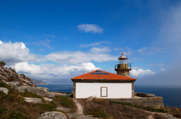 Louro, Galicia, Spain. September 12 , 2006. Lighthouse at the Ría de Muros y Noía at the Mount Louro. Louro is a touristic area at the Coast of Death