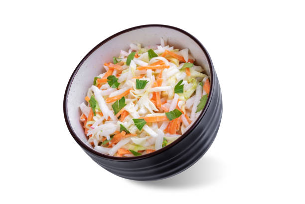 istock Radish cabbage coleslaw in a bowl on a white isolated background 2156397067