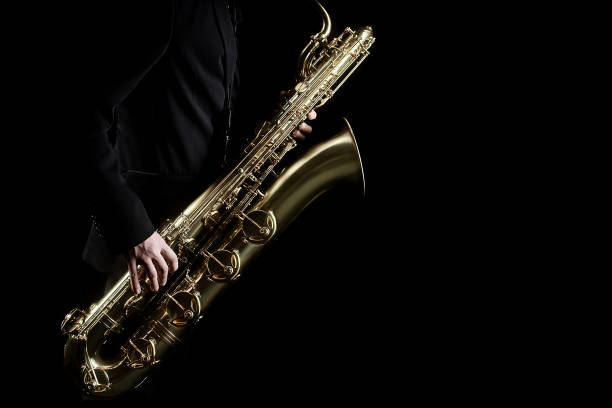 istock Saxophone baritone player with jazz music instrument 2156399151