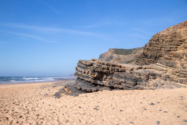istock Rocky cliffs on Cordoama beach, Algarve, Portugal. 2156405005