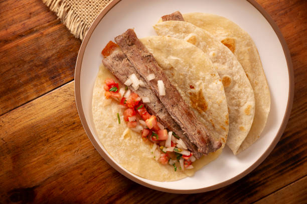 istock Grilled beef tacos mexican arrachera flatlay 2156408416