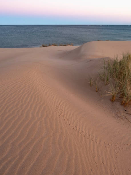 istock Sunset and sand dunes and beach 2156409633