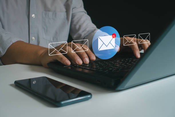 istock New email with notification alert, Direct selling project in customer list business for e-mail communication and email digital marketing concept. Businessman use laptop with email in virtual screen. 2156411400