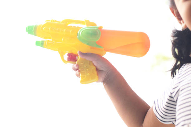 Children playing with water guns