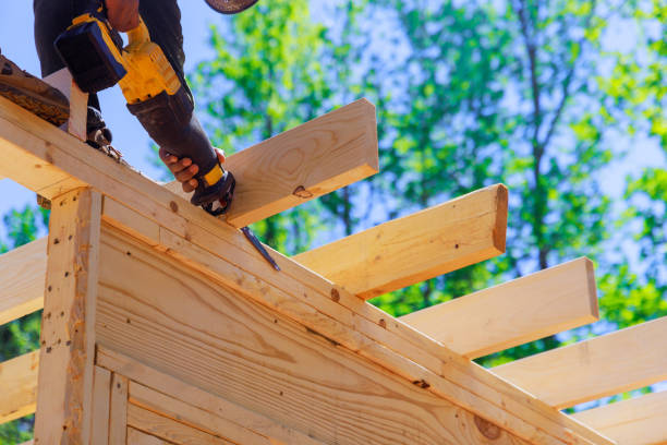 istock During construction, contractor uses a cordless reciprocating saw to cut beams 2156411483