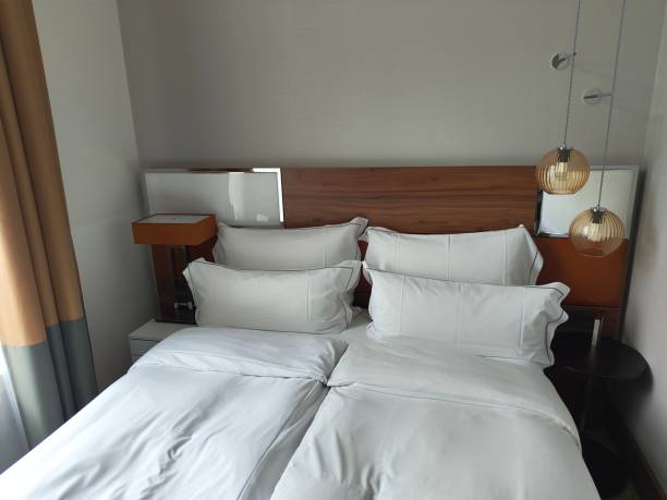 istock A modern hotel room's bed 2156413753
