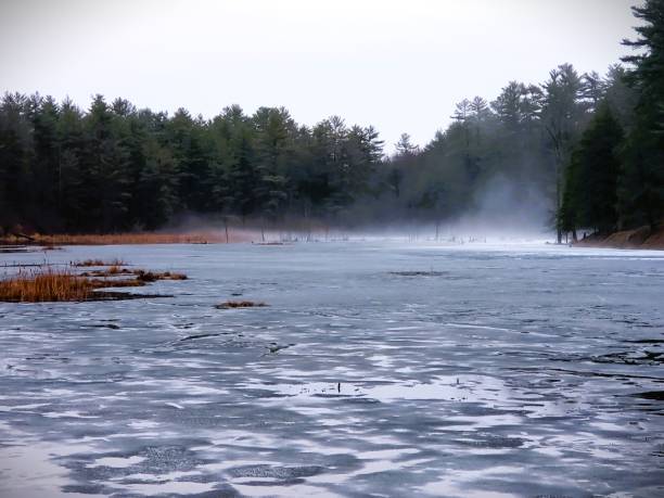 istock MIST ON A POND IN THE EARLY MORNING 2156416265