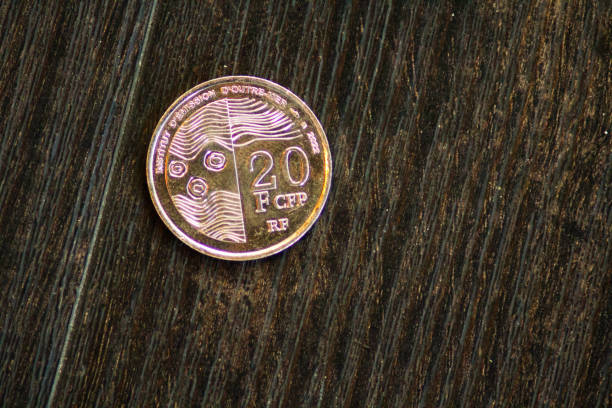 French coin of twenty francs minted in 1933, laureate head of Marianne on the left side and value and date and the inscriptions in French liberty, equality, brotherhood between two ears of wheat on the right side.