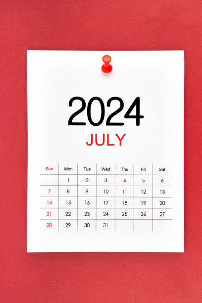 istock July 2024 calendar page with push pin on red. 2156424478