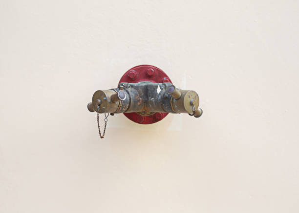 The fire hose connection point is installed on the wall of the building.