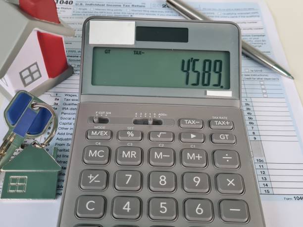 istock Calculator Showing 4589 on Tax Form 2156426919