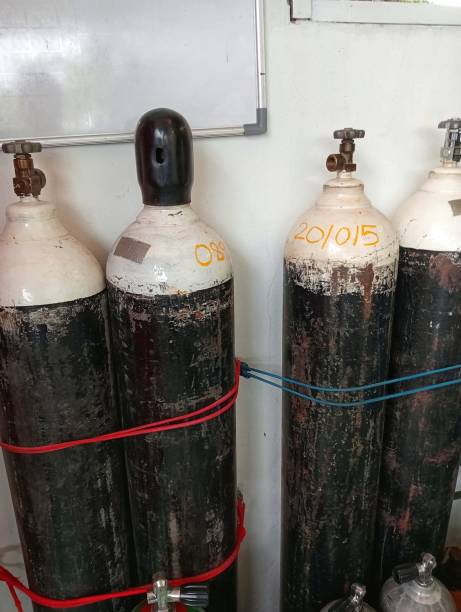 istock The oxygen cylinder tied to the white wall 2156434470