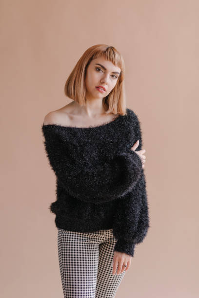 istock Short brown hair woman in a studio shoot 2156435339