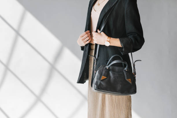 istock Casual woman carrying a hand bag 2156436616