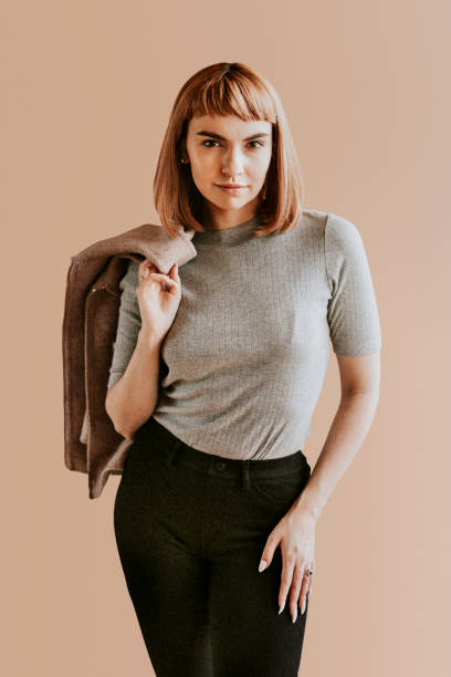 istock Short brown hair woman in a studio shoot 2156436864