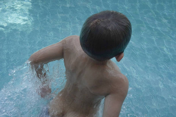 Boy Swimming in the swimming pool