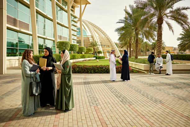 istock Teachers and students discussing in university campus 2156439545