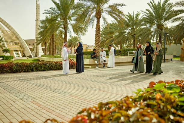 istock University staff and students in campus 2156439564