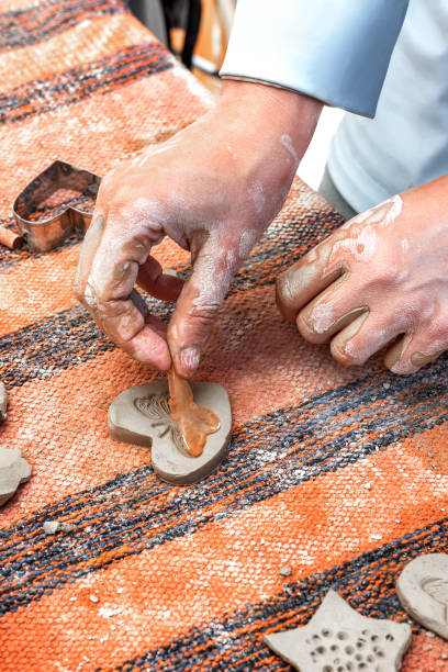 istock A masterclass in clay modeling. A heart-shaped product with a beautiful butterfly print. 2156442180