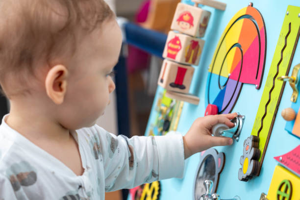 istock The kid is concentratedly spinning the wheel on the game board 2156442903