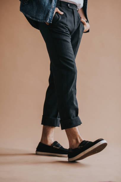 istock Casual man in a black pants 2156444158