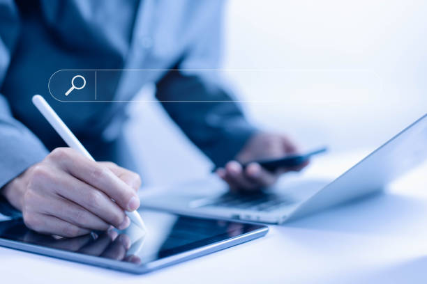 istock search bar on the laptop and tablet 2156451745