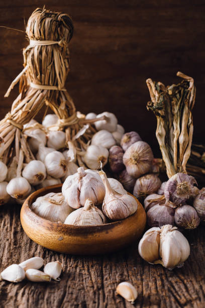 istock garlic on wooden background 2156453181