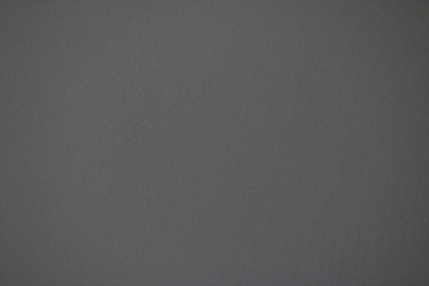 Textured dark gray paper, background. Concrete wall