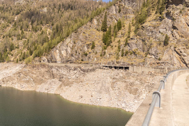 istock Rocky Hillside by a Serene Reservoir 2156462798