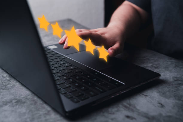 istock Woman rating service experience on online application with 5 stars. 2156465029