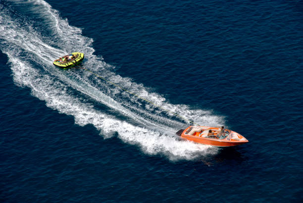 istock motorboat with wake on sea water 2156465262