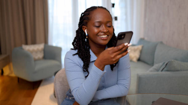 istock Happy woman sending a voicemail 2156468960
