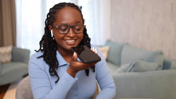 istock Happy woman sending a voicemail 2156469272