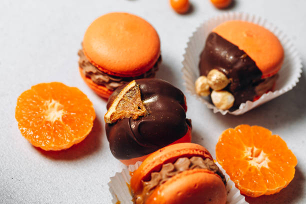 istock Set of orange macaroons on a white background 2156473940