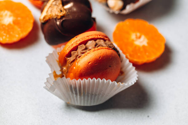 istock Set of orange macaroons on a white background 2156473942