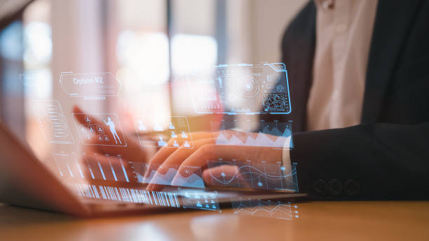 istock Businessman or an analyst uses a computer and dashboard for data business analysis and Data Management System with KPI and metrics connected to the database for technology 2156474693