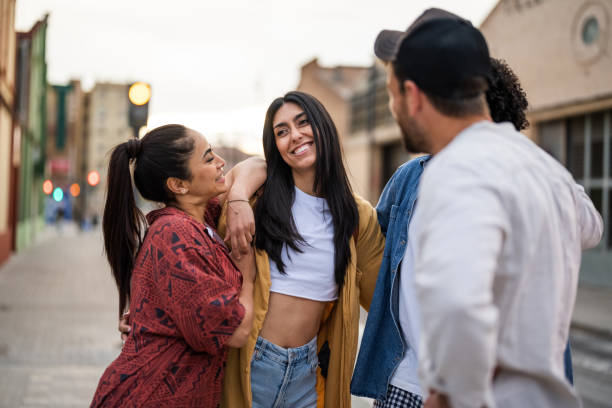 istock City Friends Enjoy Casual Stroll 2156477396