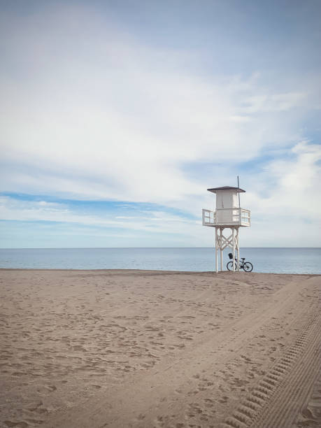 istock White lifeguard tower stands on a beach 2156478412
