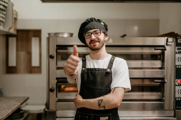 istock portrait of young handsome pizza baker chef 2156483109