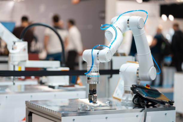 istock automated programmed robotic arm for manufacturing and industrial lines conveyor belts, robot hand equipment for factories and delivery warehouses 2156484438