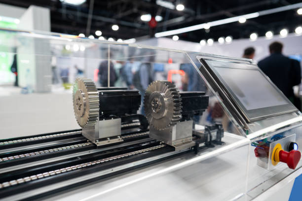 istock mechanical metallic gears with cogs mechanism, industrial machinery exhibition 2156484659